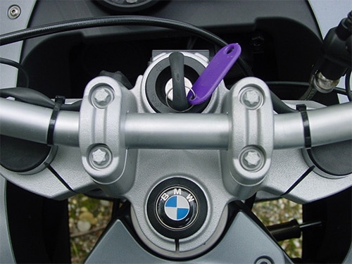 image of a BMW with a new key in the ignition