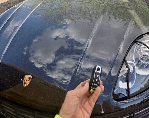 A Porsche and the new fob we programmed for it.